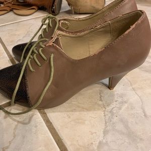 Brown and black small heel